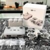 DJI NEO Fly More Combo palm drone with 3 batteries and charging hub – excellent condition