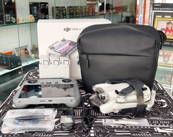 DJI Mini 4 Pro Fly More Combo with K&F ND filters, RC 2 controller, and 64GB memory card – excellent condition