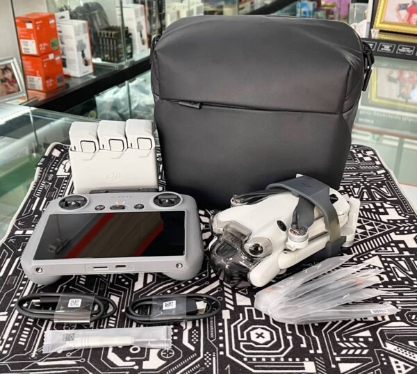 DJI Mini 4 Pro Fly More Combo with RC 2 controller, 3 batteries, and 64GB memory card – like new condition