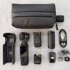 DJI Osmo Pocket 3 Creator Combo like new with 1-inch CMOS sensor, DJI Mic 2, wide lens, battery handle, and mini tripod