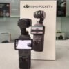 DJI Osmo Pocket 4 with Ulanzi magnetic mount, silicone case, and 128GB memory card – like new condition