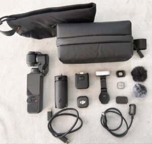 DJI Osmo Pocket 4 with Ulanzi magnetic mount, silicone case, and 128GB memory card – like new condition